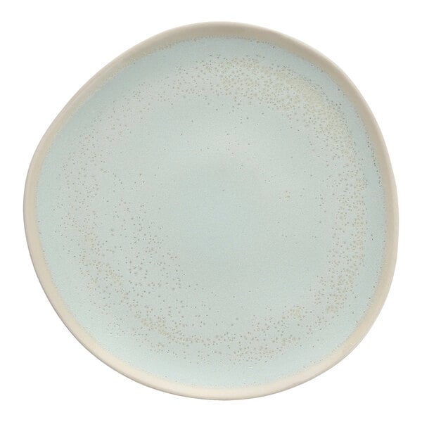 A white Cloud Terre by Fortessa bread plate with small blue dots on the surface and rim.