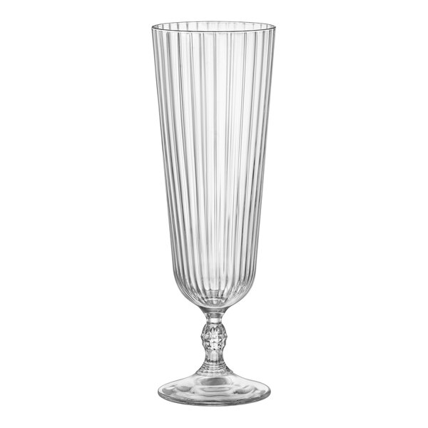 A clear Bormioli Rocco America sling cocktail glass with a stem and a silver rim.