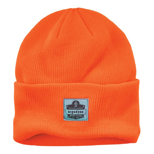 An orange rib knit beanie with a blue patch on the front.