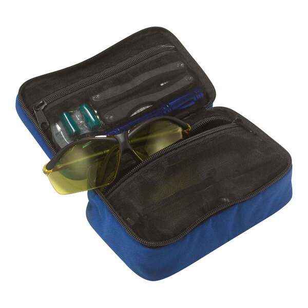 A blue Ergodyne Arsenal small buddy organizer with sunglasses and other items in it.