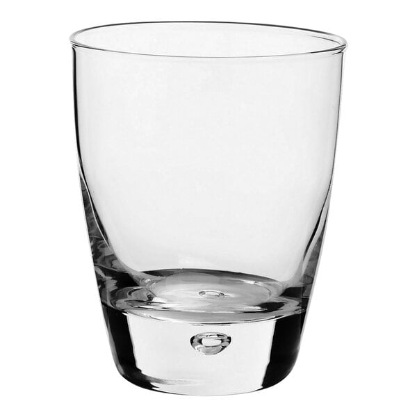 A clear Bormioli Rocco Luna rocks glass with a small bubble on the bottom.