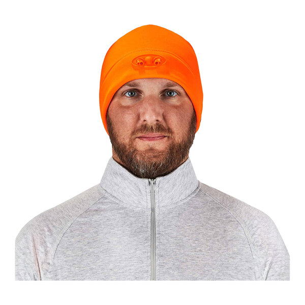 A man with a beard wearing an orange Ergodyne N-Ferno skull cap.