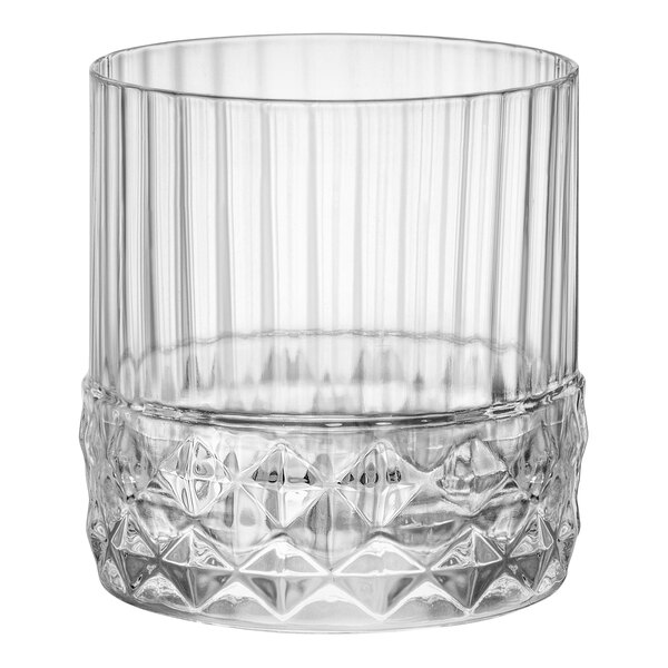 A clear Bormioli Rocco rocks glass with a diamond pattern.