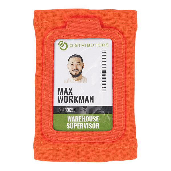 An orange wrist badge holder with a name tag inside.