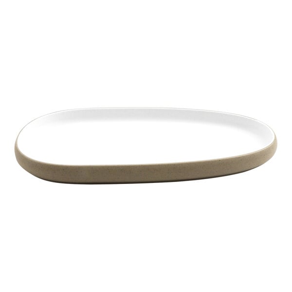 A white oval cheforward by GET melamine platter with a tan rim.