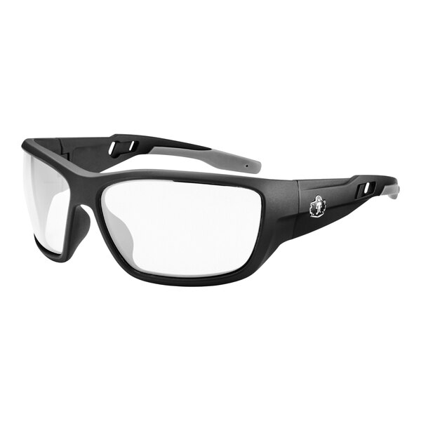 A close-up of Ergodyne Skullerz black safety glasses with clear lenses.