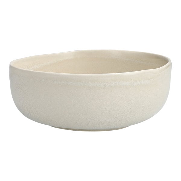 A white Cloud Terre By Fortessa Collection sand bowl.