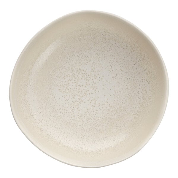 A white stoneware bowl with a speckled surface.