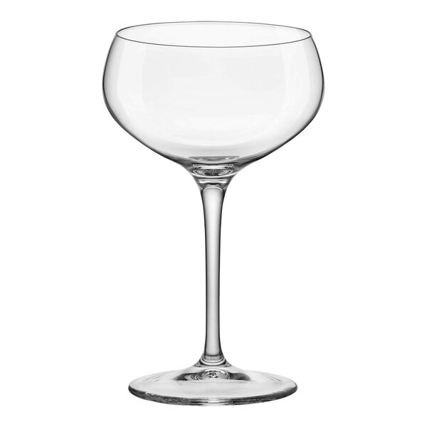 A clear wine glass with a long stem.