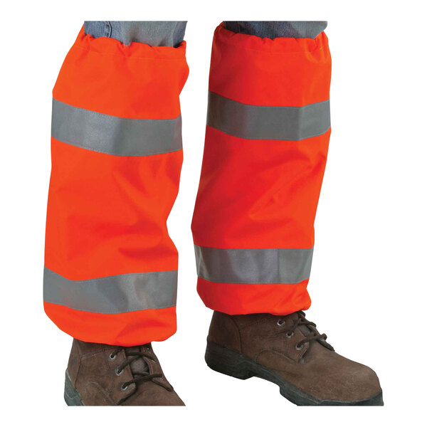 Ergodyne GloWear 8008 Class E Hi-Vis Orange Leg Gaiters with Reflective Tape worn over pants.