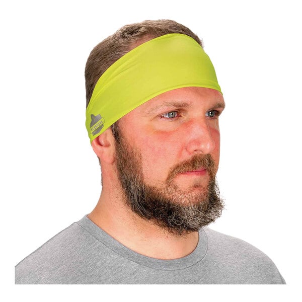 A man with a beard wearing a yellow Ergodyne Chill-Its headband.