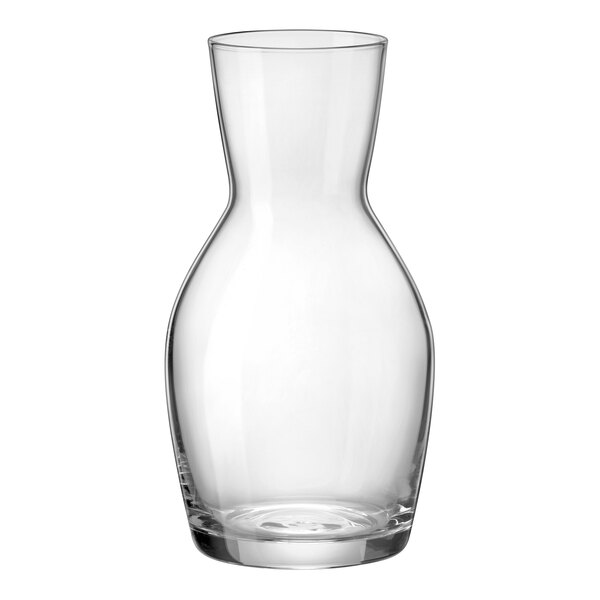 A clear glass wine carafe.