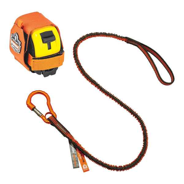 An orange and black lanyard with a carabiner attached to a yellow and black Ergodyne measuring tape.