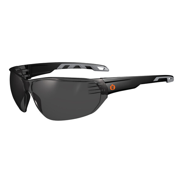 A pair of Ergodyne Skullerz VALI safety glasses with black frames and smoke lenses.