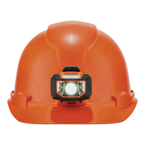 An orange Ergodyne hard hat with an LED light on it.