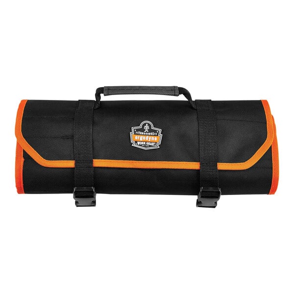 A black and orange Ergodyne Arsenal tool organizer roll up bag.