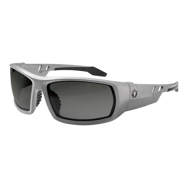 Ergodyne Skullerz ODIN Safety Glasses with Matte Gray Frame and Polarized Smoke Lenses. A close-up of a pair of sunglasses with grey lenses.