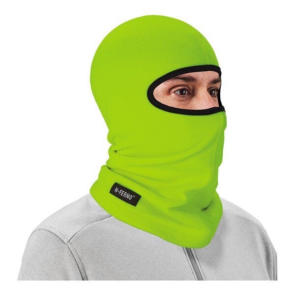 A person wearing a Hi-Vis lime green fleece balaclava.