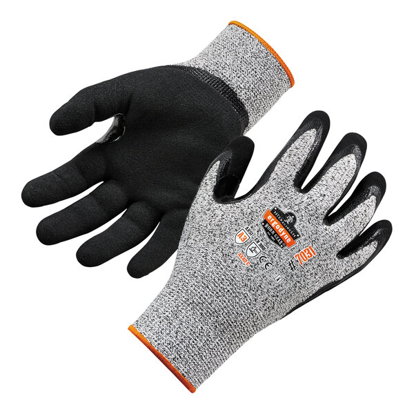 A pair of large gray and black Ergodyne ProFlex warehouse gloves with sandy nitrile palms.