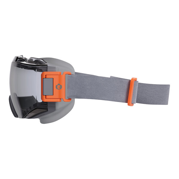 Ergodyne Skullerz safety goggles with a grey frame and orange strap.