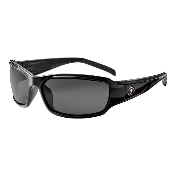 Ergodyne Skullerz THOR Safety Glasses with Black Frame and Polarized Smoke Lenses. A close-up of black safety glasses with grey lenses.