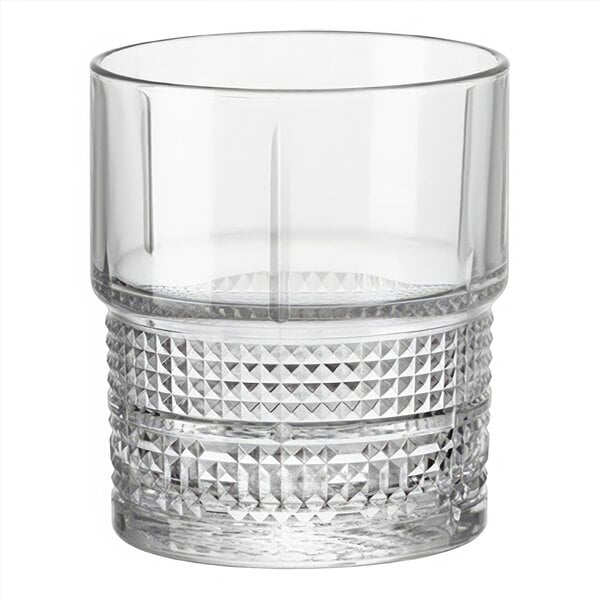 A clear Bormioli Rocco Novecento rocks glass with a diamond pattern.