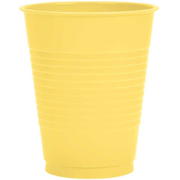 A yellow plastic cup on a white background.