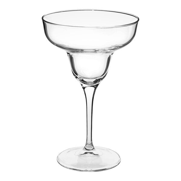 A close-up of a clear Bormioli Rocco Ypsilon margarita glass with a stem.