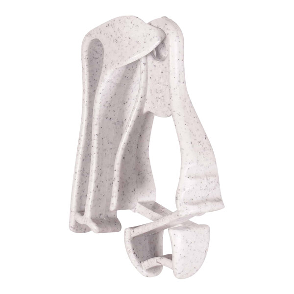 A white plastic Ergodyne Squids glove clip with black specks.