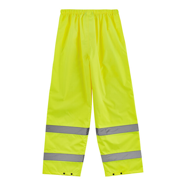 A pair of yellow Ergodyne rain pants with reflective stripes.