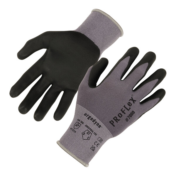 A pair of black and grey Ergodyne ProFlex warehouse gloves with black and grey rubber palms.