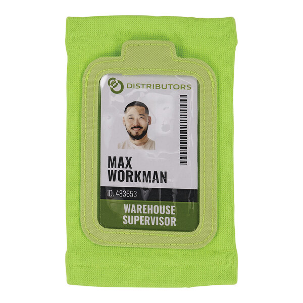 A lime green wristband with a worker's ID card attached.