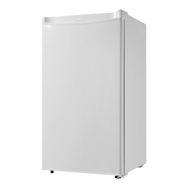 A white Danby reach-in refrigerator with a black handle.