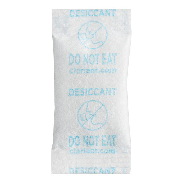 A close-up of a white Clariant Sorb-It desiccant packet with blue text on it.