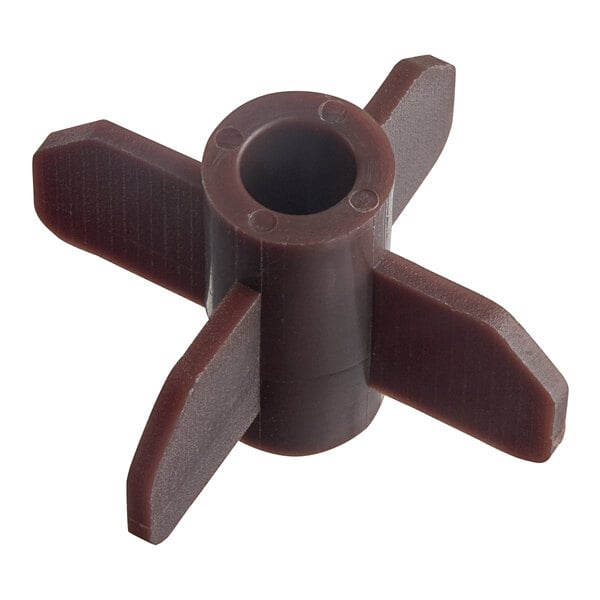 A brown plastic stirrer attachment for a cappuccino or hot chocolate machine.