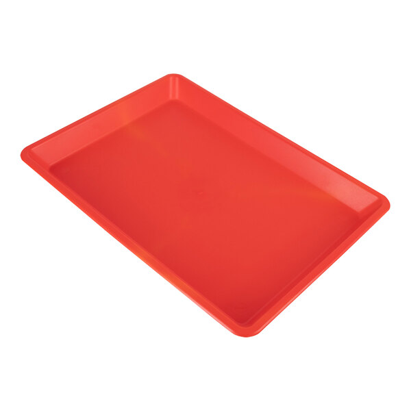 A red rectangular HS Inc. plastic baking tray.