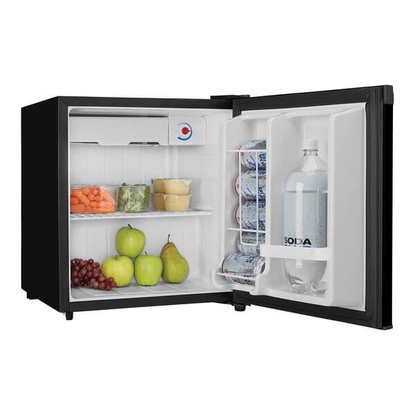 A Danby black solid door reach-in refrigerator with fruits and drinks inside.