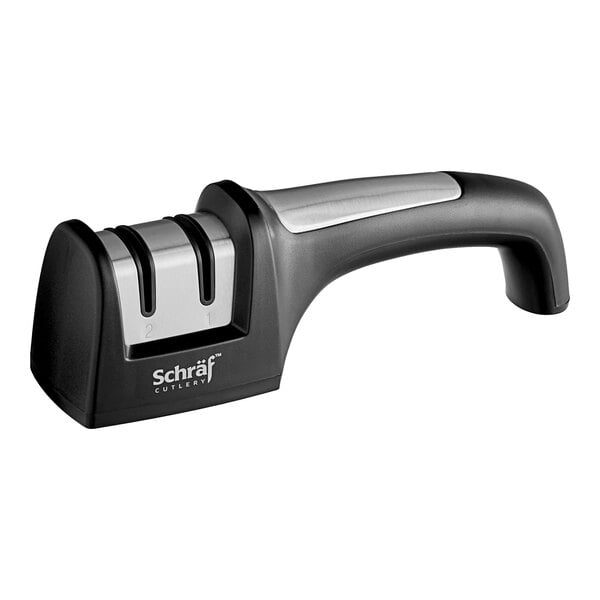 A Schraf handheld knife sharpener with a black handle on a counter.