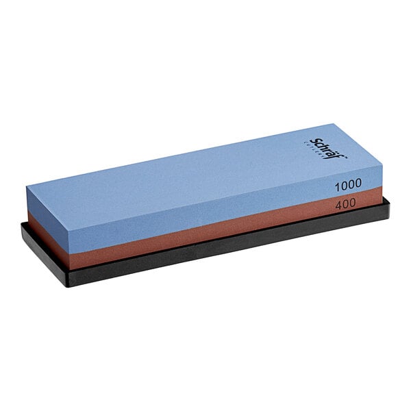A rectangular Schraf combination sharpening stone with blue and brown sides.