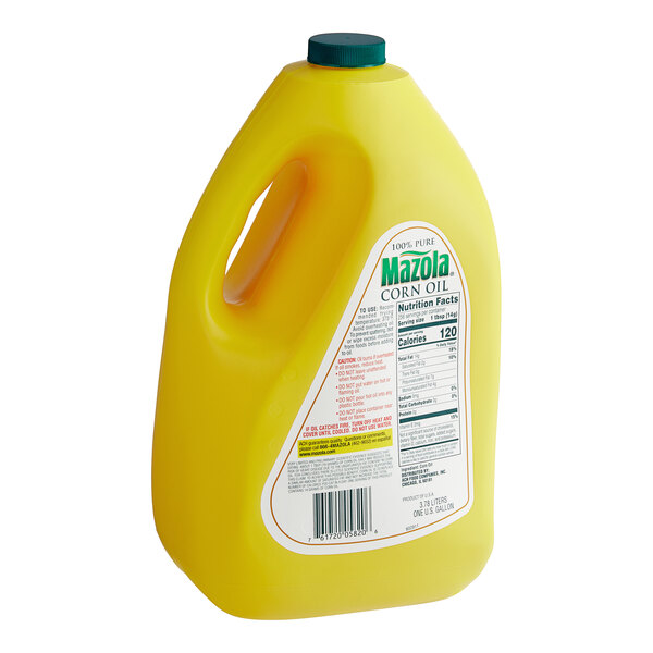 A yellow plastic jug of Mazola Corn Oil with a label.