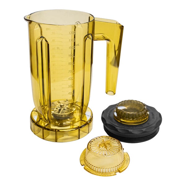 A black Bossen tea making blender container with a yellow lid and handle.