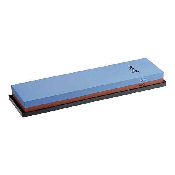 A rectangular Schraf combination sharpening stone with blue and brown sides.