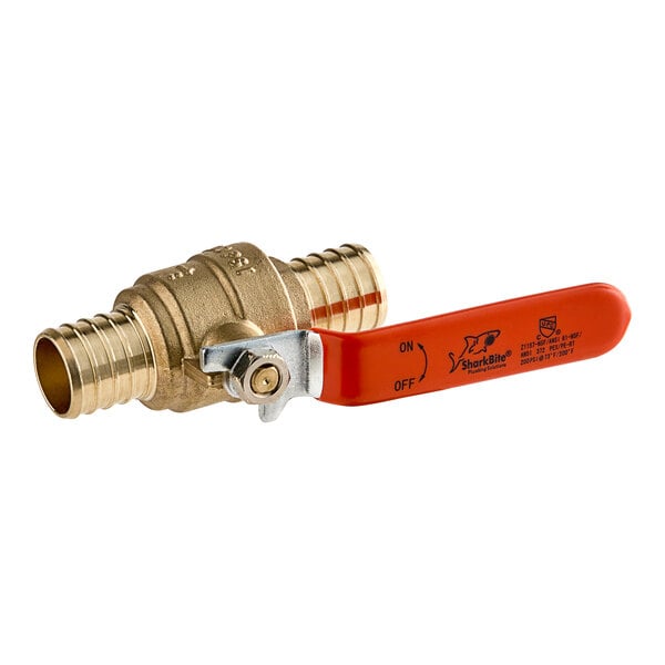 A SharkBite brass ball valve with a red handle.