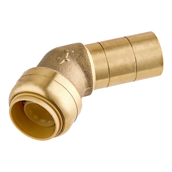 A SharkBite brass pipe fitting with a gold colored end.