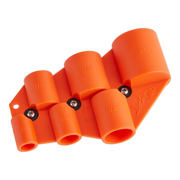 An orange plastic SharkBite deburr and depth gauge tool holder.