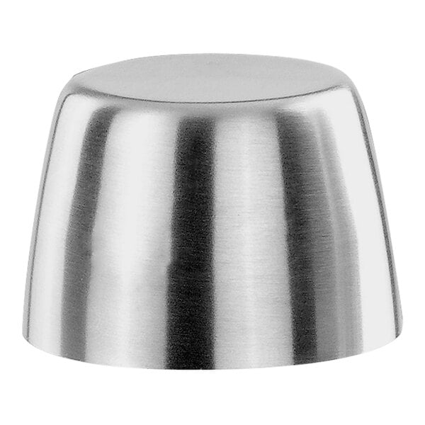 A Modern Mixologist stainless steel cobbler cap on a silver metal cup.