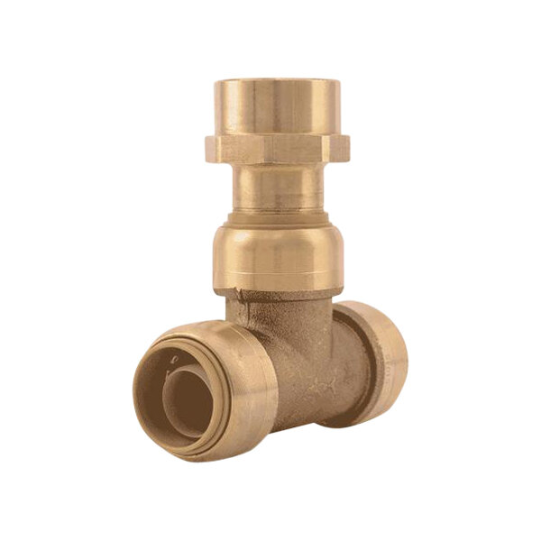 A close-up of a brass SharkBite pipe tee.