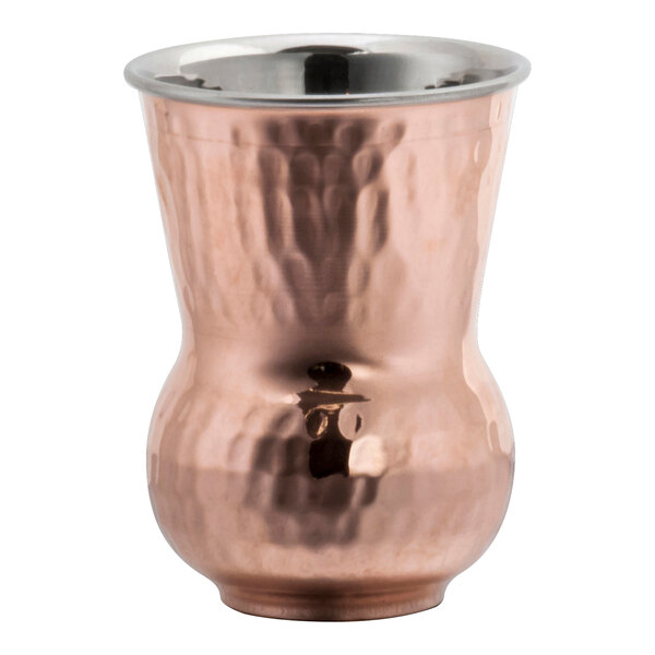 A close up of a Steelite International copper tumbler with a silver rim.