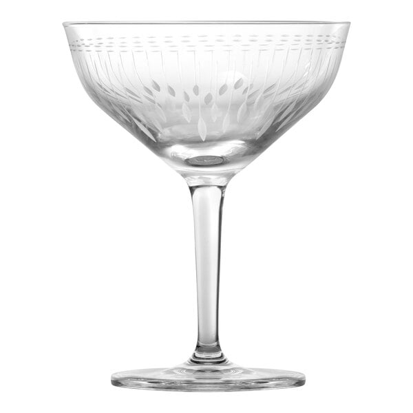 A clear Schott Zwiesel martini glass with a patterned stem.