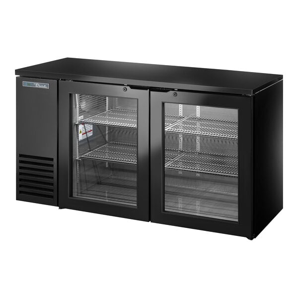 A True black back bar refrigerator with glass doors.